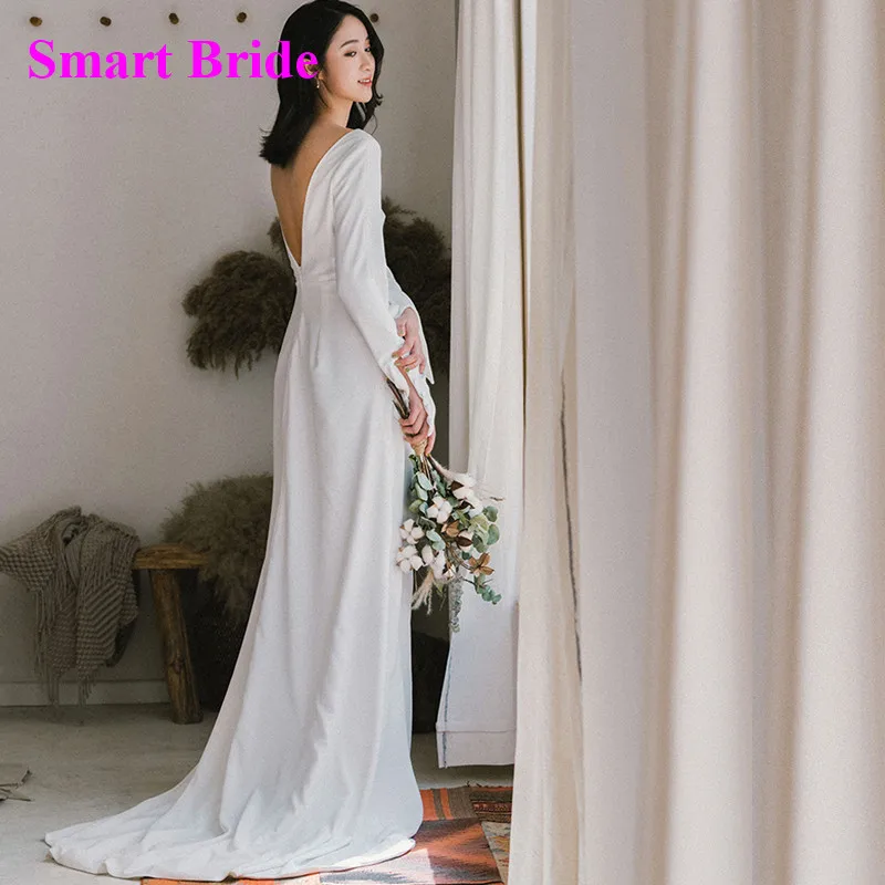 Simple V Neck Beach Wedding Dress with Long Sleeves Split Backless Soft Satin A Line French Retro White Bridal Formal Gowns VS32
Simple V Neck Beach Wedding Dress with Long Sleeves Split Backless Soft Satin A Line French Retro White Bridal Formal Gowns VS32