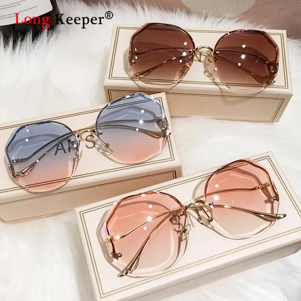 Fashion Oversized Rimless Sunglasses Women Luxury Brand Design Sexy Metal Curved Temples Sun Glasses For Female Ocean Cut Lens
Fashion Oversized Rimless Sunglasses Women Luxury Brand Design Sexy Metal Curved Temples Sun Glasses For Female Ocean Cut Lens