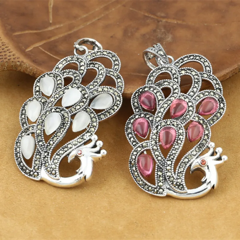 Кулон унисекс из тайского серебра 925 пробы, с опалом и павлином
Кулон унисекс из тайского серебра 925 пробы, с опалом и павлином