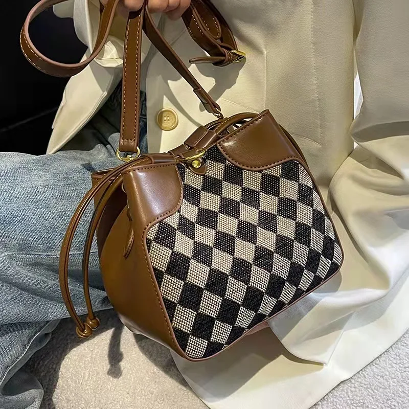 Popular bags female new trendy bags niche messenger bag fashion all-match bucket bag high-quality texture shoulder bag
Popular bags female new trendy bags niche messenger bag fashion all-match bucket bag high-quality texture shoulder bag