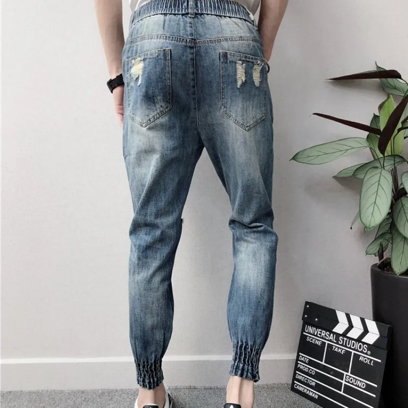 Fashion Mens Elastic Waist Denim Harem Pants Hole Ripped Joggers Jeans Man Summer Casual Ankle Length Cowboy Pencil Pants 28-38
Fashion Mens Elastic Waist Denim Harem Pants Hole Ripped Joggers Jeans Man Summer Casual Ankle Length Cowboy Pencil Pants 28-38