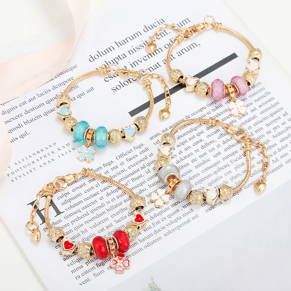 New fashion personality golden love beads four-leaf clover pendant titanium steel bracelet exquisite female temperament bracelet
New fashion personality golden love beads four-leaf clover pendant titanium steel bracelet exquisite female temperament bracelet