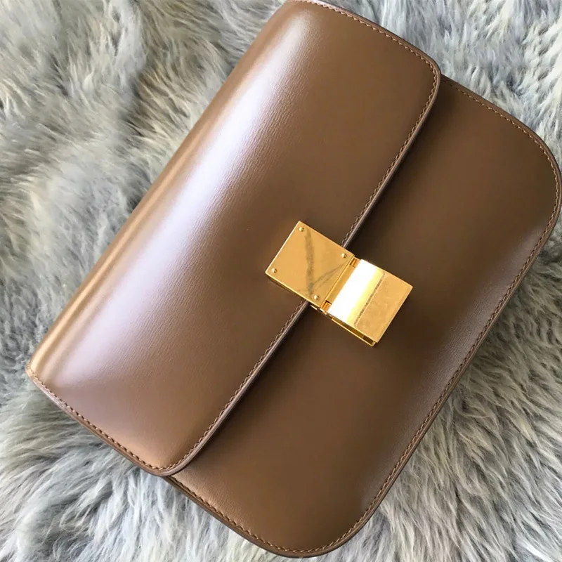 2021 New Retro Tofu Bag Box Lock Small Square Cowhide Bag Shoulder Slung Stewardess Bag Leather Handbag
2021 New Retro Tofu Bag Box Lock Small Square Cowhide Bag Shoulder Slung Stewardess Bag Leather Handbag