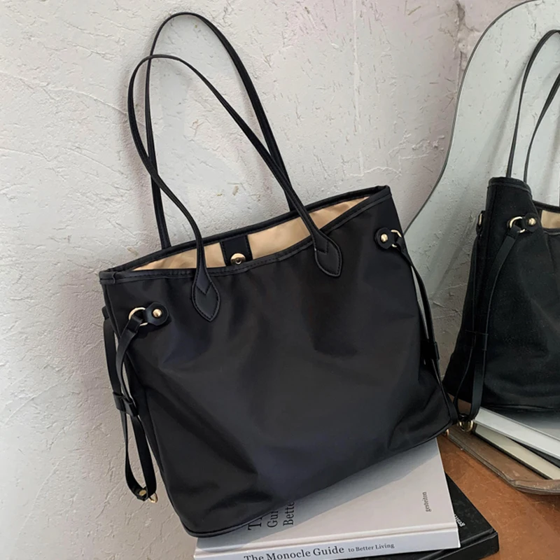 2021 Ladies Large Capacity Nylon Shoulder bag Shopping Bag Fashion Solid Color Casual Handbag Luxury Handbag Lady Bag Designer
2021 Ladies Large Capacity Nylon Shoulder bag Shopping Bag Fashion Solid Color Casual Handbag Luxury Handbag Lady Bag Designer