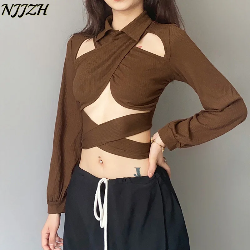 NJJZH2022 winter spring Fashion Women Solid Sexy lapel Long Sleeve Hollow Out Bandage Patchwork High Waist Leisure Slim T-shirts
NJJZH2022 winter spring Fashion Women Solid Sexy lapel Long Sleeve Hollow Out Bandage Patchwork High Waist Leisure Slim T-shirts
