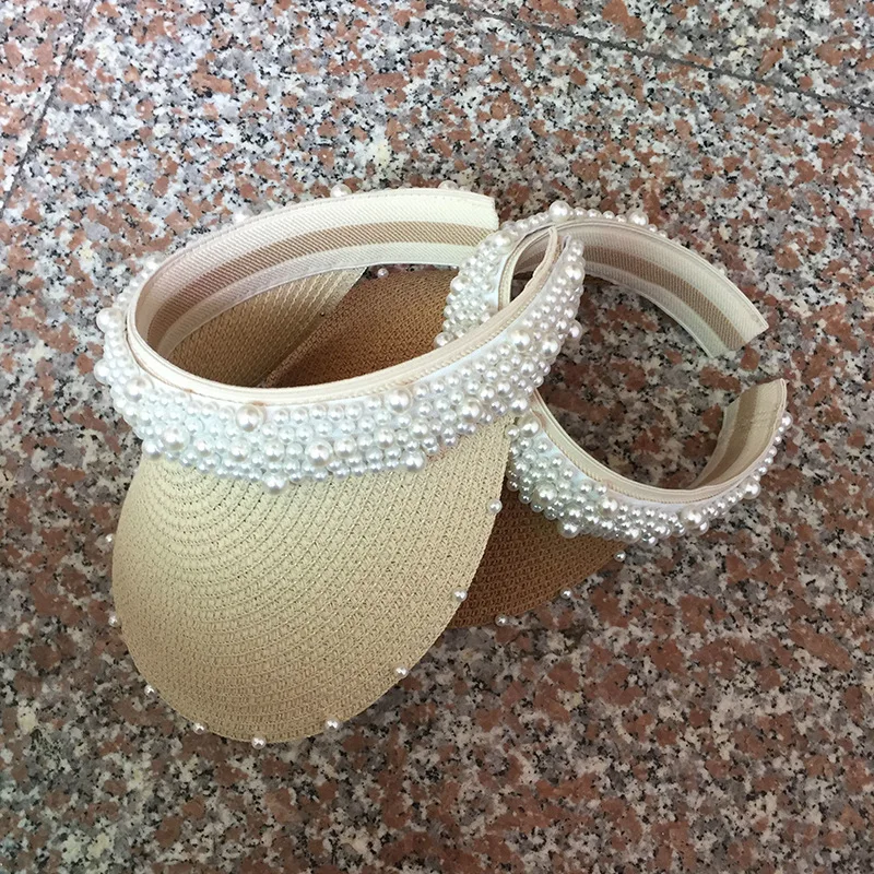 2020 New Fashion straw pearl Headpiece Casual Women knitted summer Cap Occasion Hat Visor Baseball Cap Empty Top Sun Hat
2020 New Fashion straw pearl Headpiece Casual Women knitted summer Cap Occasion Hat Visor Baseball Cap Empty Top Sun Hat