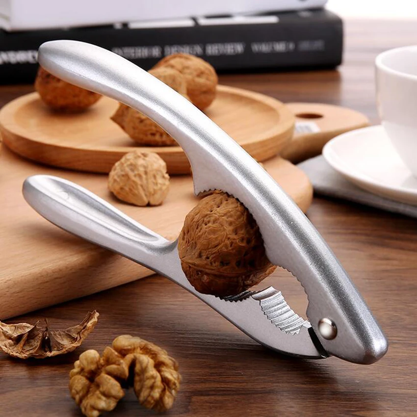 1Pc 17.5*4cm Aluminum alloy walnut folder nuts clip peeling tools open kitchen gadgets fruit walnut sheller cutter
1Pc 17.5*4cm Aluminum alloy walnut folder nuts clip peeling tools open kitchen gadgets fruit walnut sheller cutter