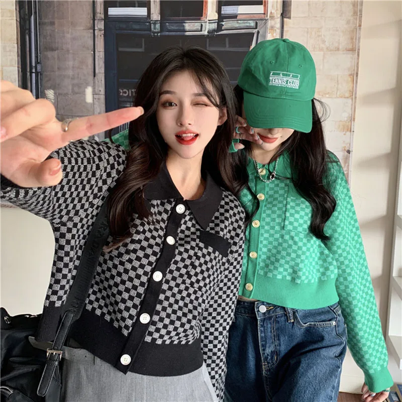 Весенне-осенний модный универсальный короткий женский черный клетчатый кардиган свитер женский корейский Харадзюку элегантный повседнев... 
Весенне-осенний модный универсальный короткий женский черный клетчатый кардиган свитер женский корейский Харадзюку элегантный повседнев...