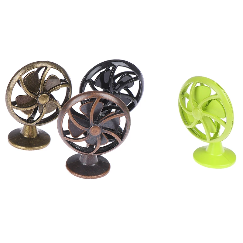 1/12 Dollhouse Miniature Accessories Mini Alloy Electric Fan Simulation Model Toys for Doll House Decoration
1/12 Dollhouse Miniature Accessories Mini Alloy Electric Fan Simulation Model Toys for Doll House Decoration