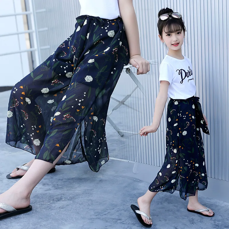Summer Girls Pants New Kids Printed Chiffon Wide Leg Pants Loose Casual Child Nine Pants Skirt Pants Wide Leg Pants
Summer Girls Pants New Kids Printed Chiffon Wide Leg Pants Loose Casual Child Nine Pants Skirt Pants Wide Leg Pants
