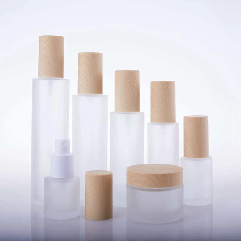 5pcs/lot Good Quality 1OZ 2OZ 3OZ 20g 30g 50g Wood Grain Lid Frosted Glass Cream Jars Spray Lotion Bottle with Press Pump
5pcs/lot Good Quality 1OZ 2OZ 3OZ 20g 30g 50g Wood Grain Lid Frosted Glass Cream Jars Spray Lotion Bottle with Press Pump