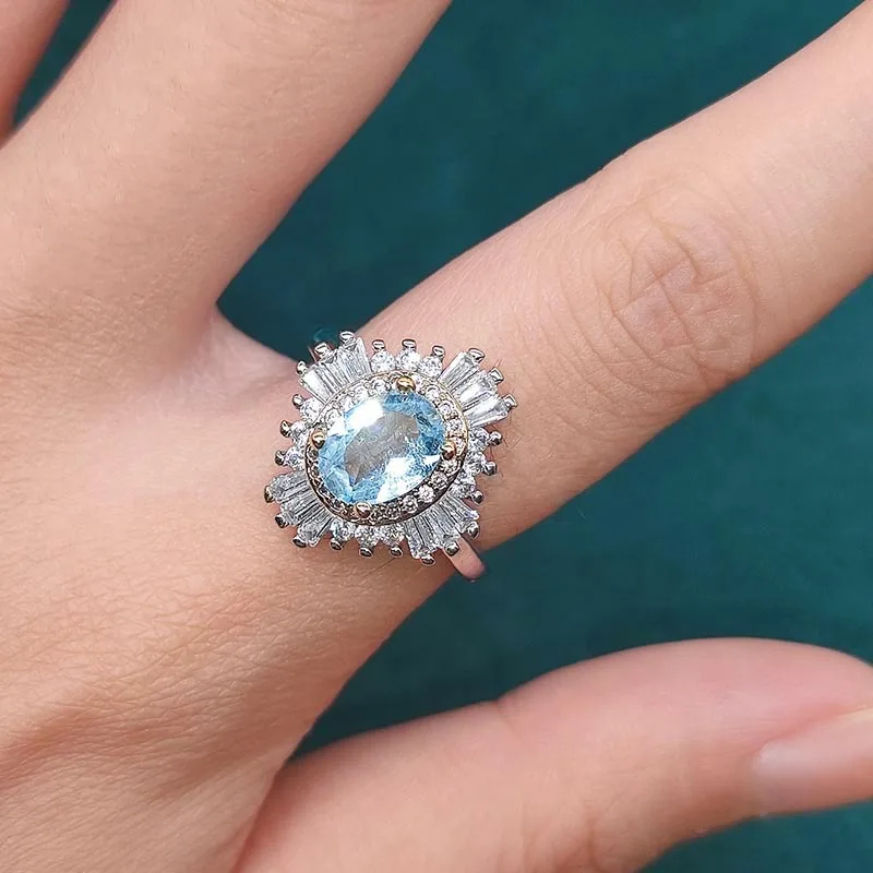 

Женское Открытое кольцо с голубым топазом, серебро 925 пробы