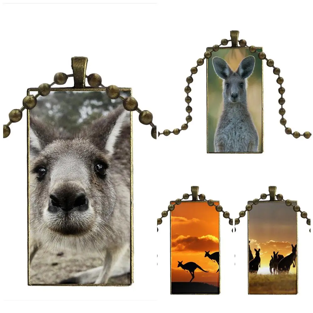 Бижутерия со стеклянными кабошонами бронзового цвета с колье с длинной подвеской прямоугольное ожерелье для унисекс милое животное кенгур... 
Бижутерия со стеклянными кабошонами бронзового цвета с колье с длинной подвеской прямоугольное ожерелье для унисекс милое животное кенгур...