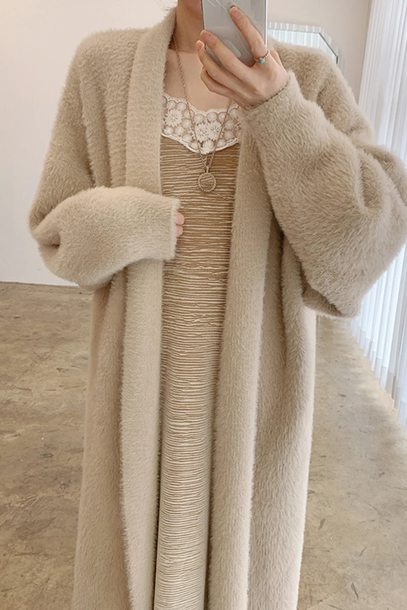 Korean autumn and winter elegant loose knee-length long-sleeved long-sleeved warm heavy mink wool cardigan jacket women
Korean autumn and winter elegant loose knee-length long-sleeved long-sleeved warm heavy mink wool cardigan jacket women