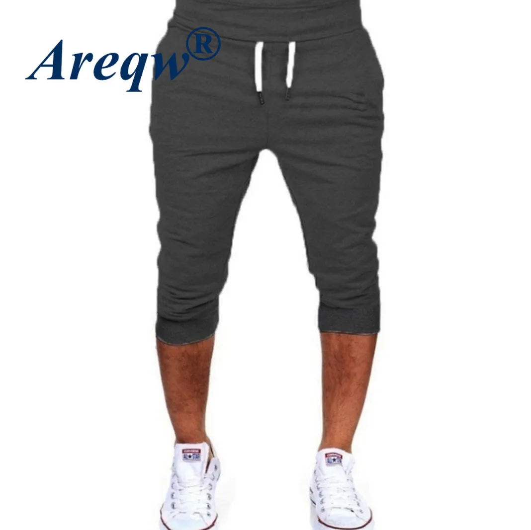2021 New Casual Sports Slim Solid Color Five-point Jogging Pants Men's Tethered Shorts 
2021 New Casual Sports Slim Solid Color Five-point Jogging Pants Men's Tethered Shorts