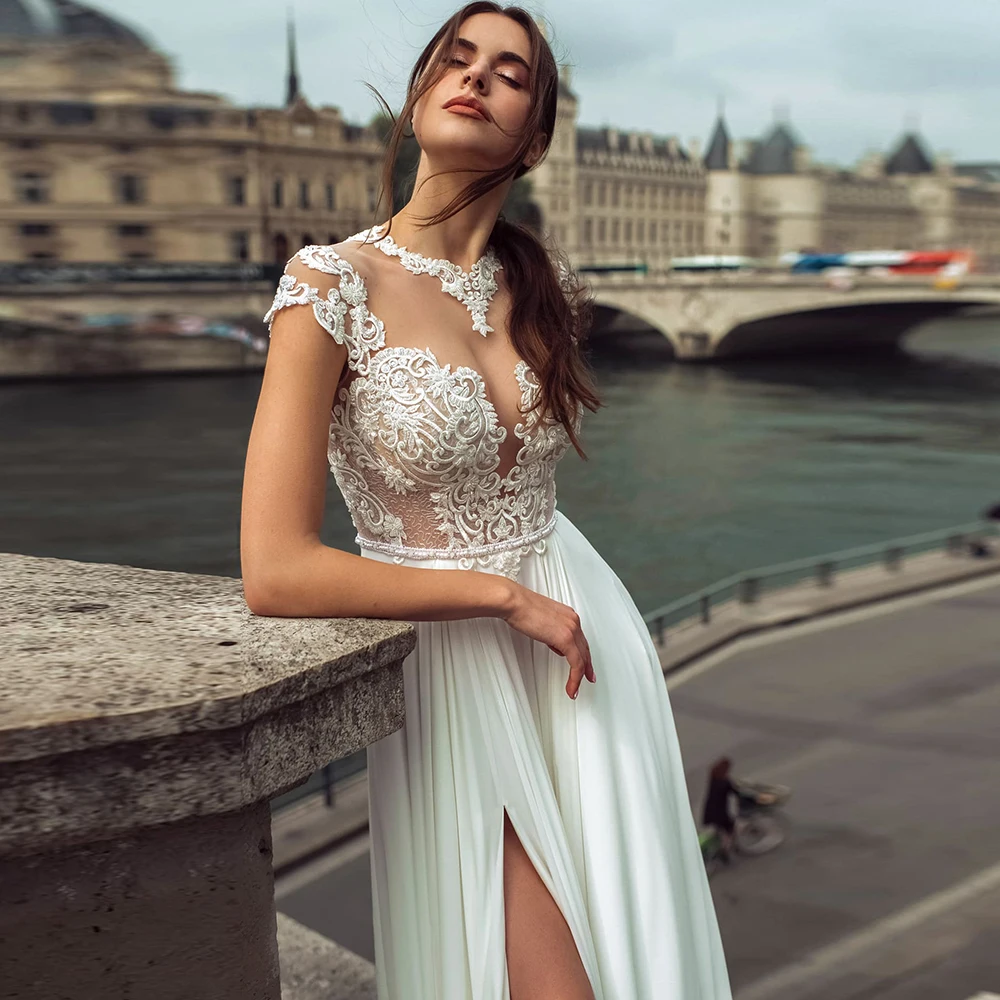 Sexy O-Neck Short Sleeve Wedding Dresses See-Through Front High Split Lace Appliques Chiffon Bridal Gown
Sexy O-Neck Short Sleeve Wedding Dresses See-Through Front High Split Lace Appliques Chiffon Bridal Gown