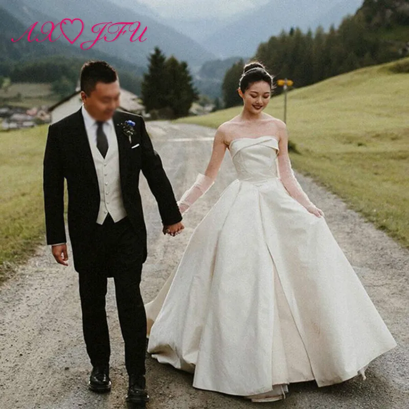 AXJFU Luxury princess white satin strapless sleeveless wedding dress party vintage bow dubai train simple bride wedding dress
AXJFU Luxury princess white satin strapless sleeveless wedding dress party vintage bow dubai train simple bride wedding dress