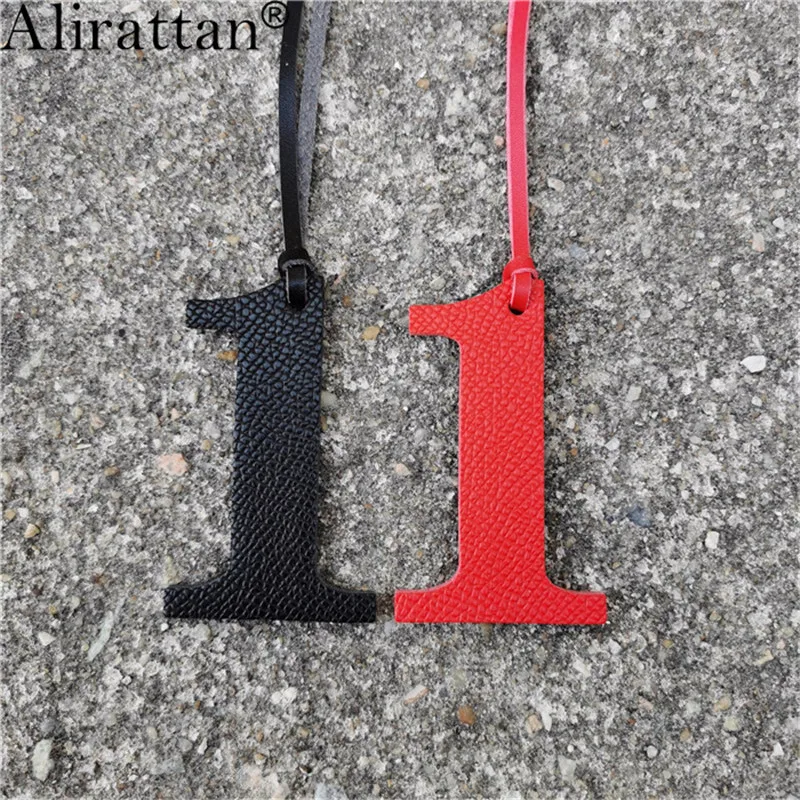 Alirattan New Genuine Leather Numbers 1 Character Charm DIY Pendant Trendy Custom Women Leather Customized Pendant Bag Ornaments
Alirattan New Genuine Leather Numbers 1 Character Charm DIY Pendant Trendy Custom Women Leather Customized Pendant Bag Ornaments