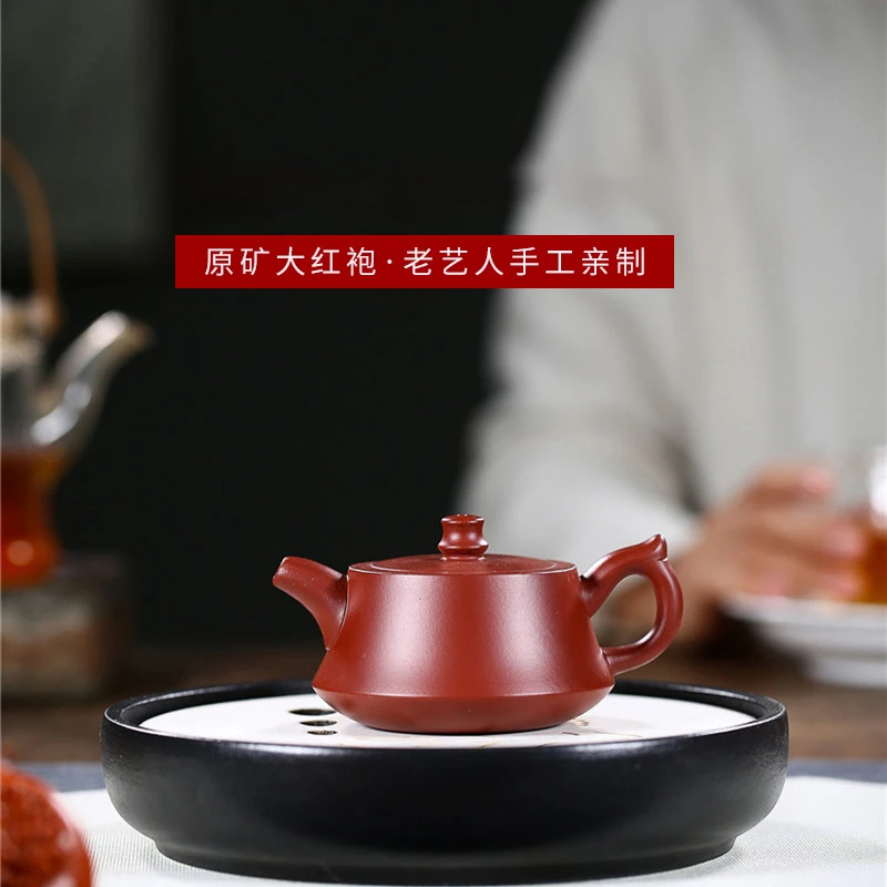 Yixing Purple Clay Pot Raw Mine Dahongpao Hand-made Column Base Pot Kung Fu Tea Set Teapot Capacity 200ml
Yixing Purple Clay Pot Raw Mine Dahongpao Hand-made Column Base Pot Kung Fu Tea Set Teapot Capacity 200ml