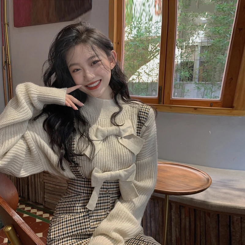 Early Spring New Korean Bow Knitted Long Sleeve Sweater Women + Plaid Skirt Two Piece Set
Early Spring New Korean Bow Knitted Long Sleeve Sweater Women + Plaid Skirt Two Piece Set