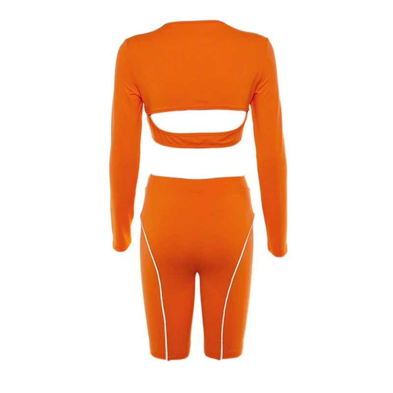 2pcs Women's Solid Color Suit, Round Neck Hollow Long-sleeved Top + Fluorescent Shorts, Sexy Party Nightclub Wear
2pcs Women's Solid Color Suit, Round Neck Hollow Long-sleeved Top + Fluorescent Shorts, Sexy Party Nightclub Wear