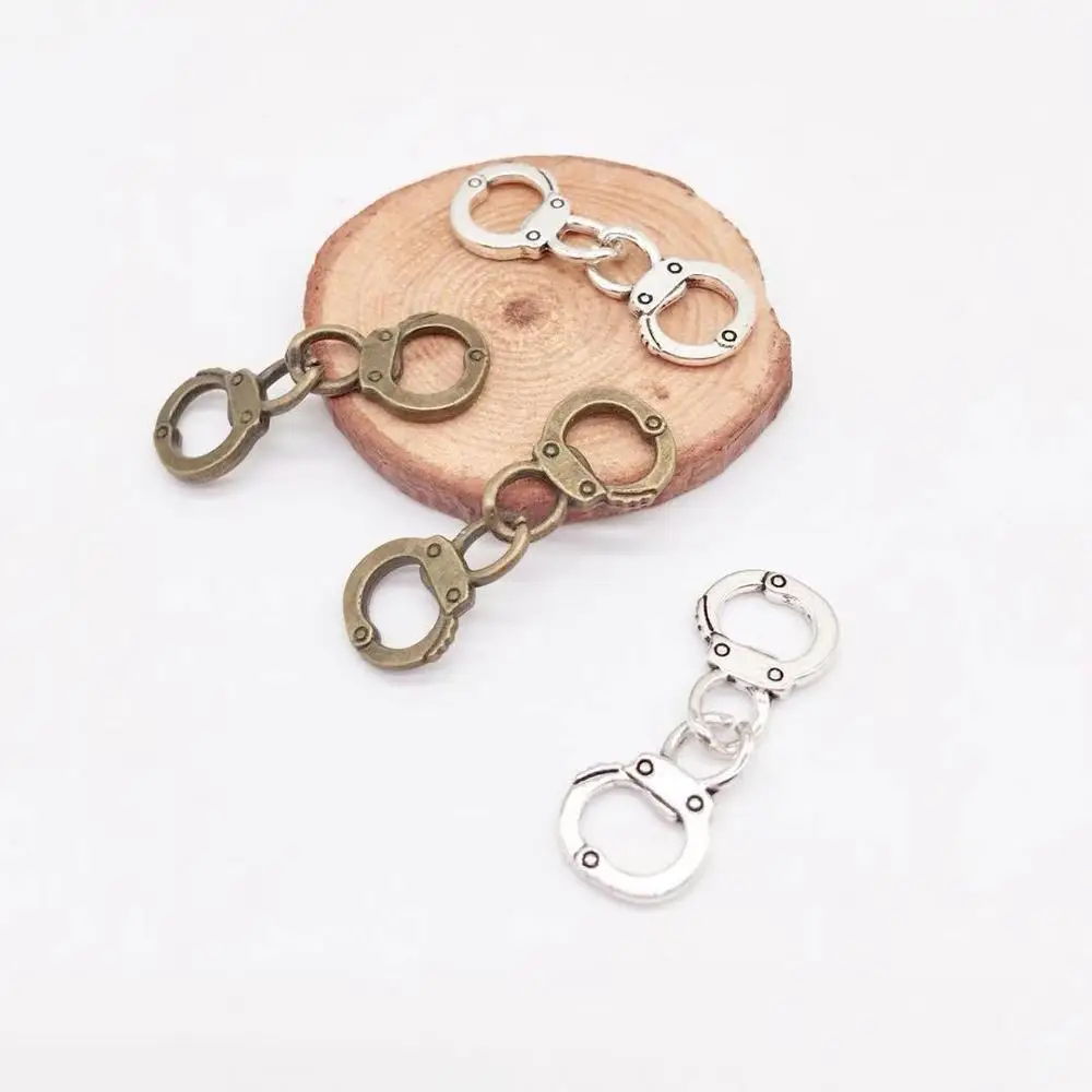 Vintage 7 pcs handcuffs charms metal tiny handcuffs Pendants fit DIY bracelet necklace charms Jewelry Making
Vintage 7 pcs handcuffs charms metal tiny handcuffs Pendants fit DIY bracelet necklace charms Jewelry Making