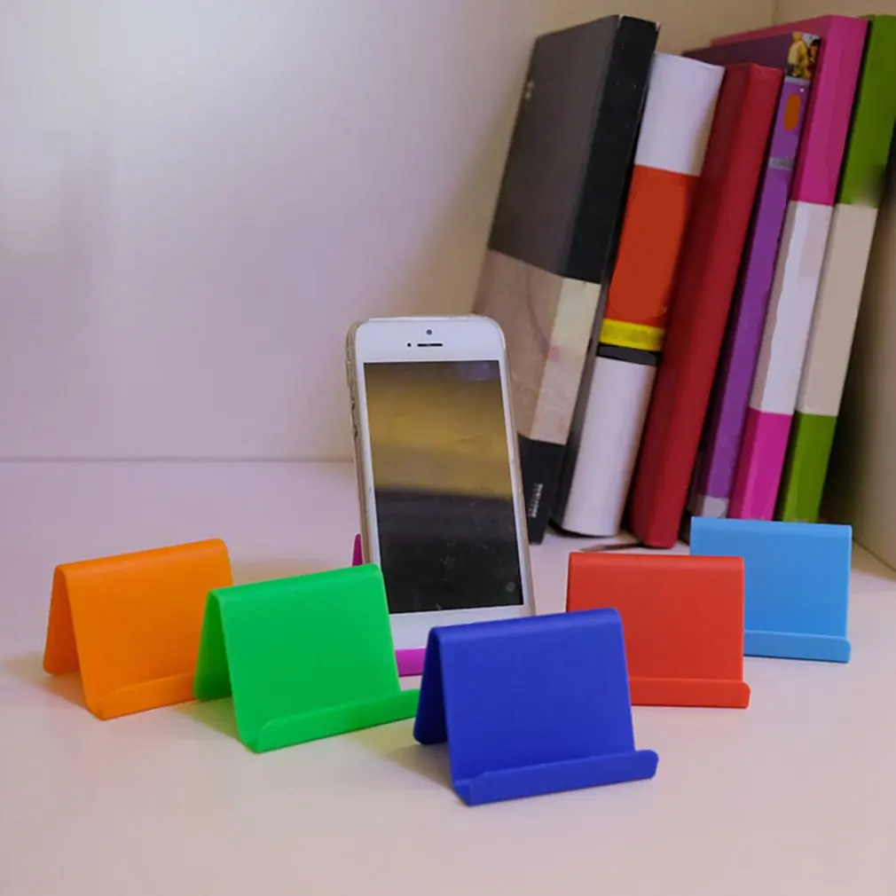 Mobile Phone Holder Candy Mini Portable Fixed Holder Home Supplies Mobile Phone Remote Control Bracket holder
Mobile Phone Holder Candy Mini Portable Fixed Holder Home Supplies Mobile Phone Remote Control Bracket holder