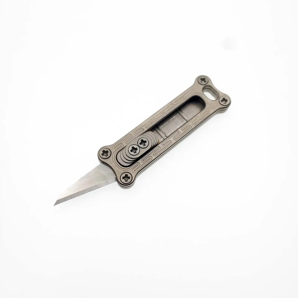 Dropship Brass+Titanium kalloy art knife Sliding Blade Paper Knife Key Ring Pocket Knife Outdoor EDC tool Express card knife
Dropship Brass+Titanium kalloy art knife Sliding Blade Paper Knife Key Ring Pocket Knife Outdoor EDC tool Express card knife