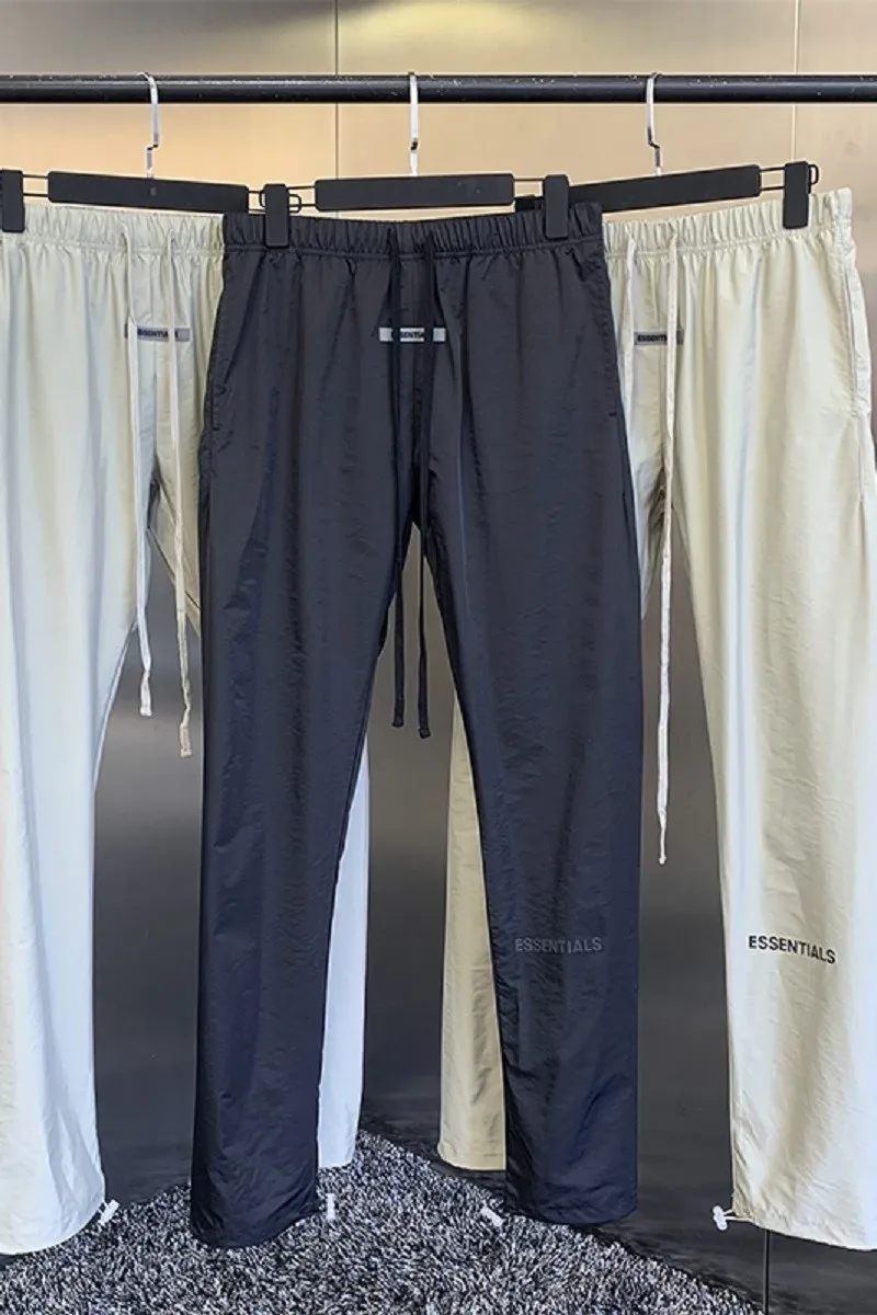 2021 summer new men's casual pants high quality designer brand high street hip hop loose nylon logo reflective sports pants
2021 summer new men's casual pants high quality designer brand high street hip hop loose nylon logo reflective sports pants