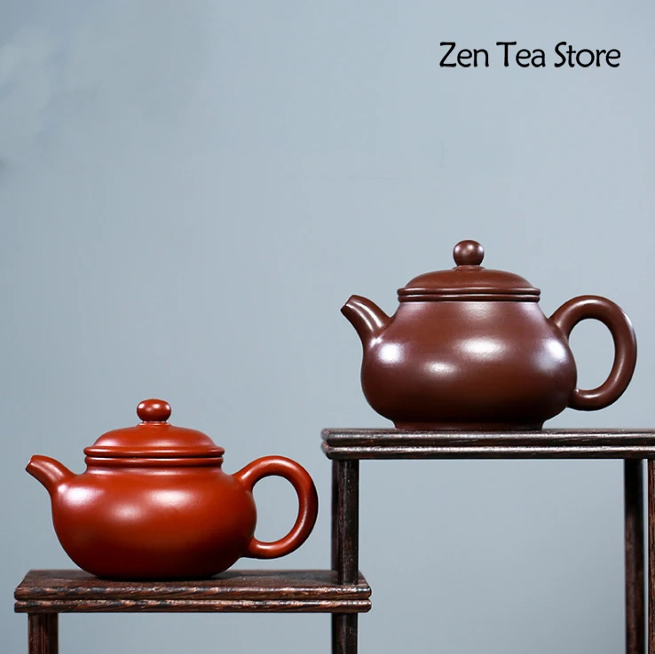Yixing Raw Ore Purple Clay Xishi Zisha Pot Pure Hand Made Purple Mud Beauty Health Kettles Tea Pot Ball Hole Filter Tea Set Gift
Yixing Raw Ore Purple Clay Xishi Zisha Pot Pure Hand Made Purple Mud Beauty Health Kettles Tea Pot Ball Hole Filter Tea Set Gift