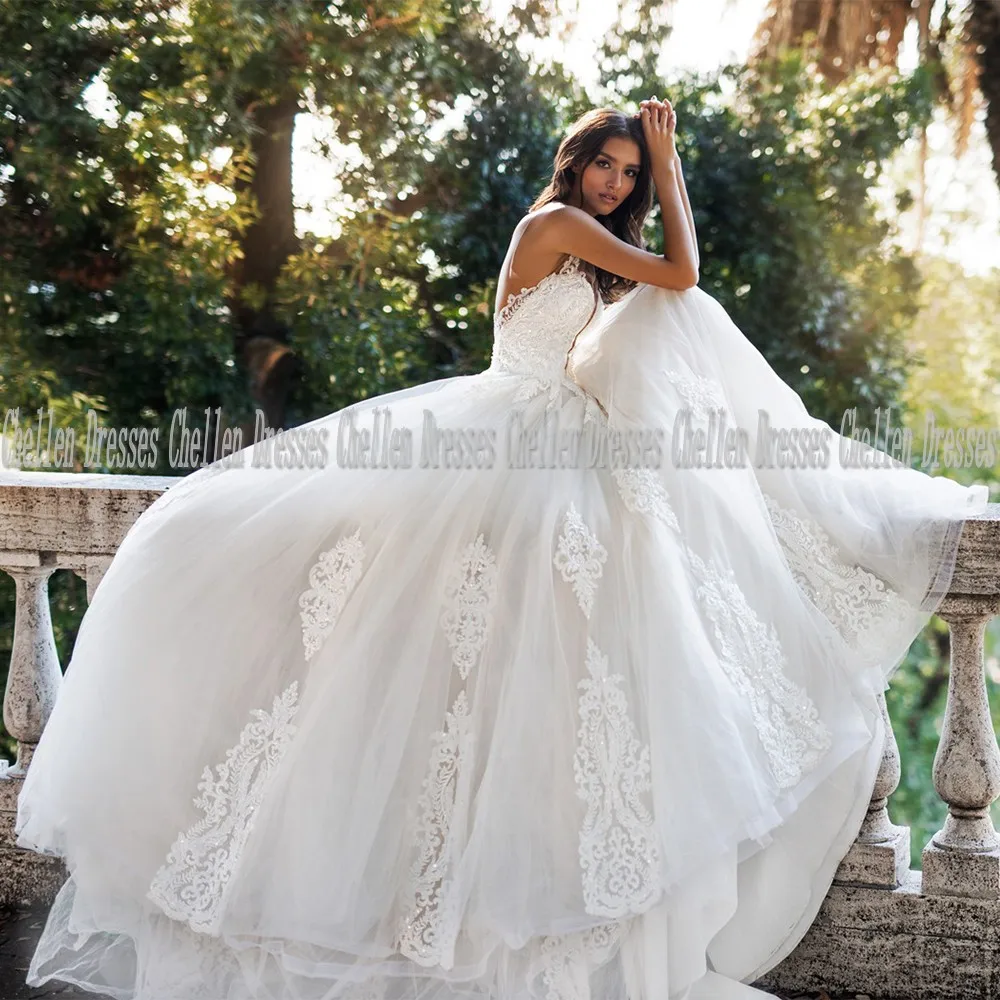 2021New Elegant Sheer O Neck Custom Made Beading Sequined Lace Applique Illusion Backless Tulle Ball Gown Wedding Dress Vestido
2021New Elegant Sheer O Neck Custom Made Beading Sequined Lace Applique Illusion Backless Tulle Ball Gown Wedding Dress Vestido