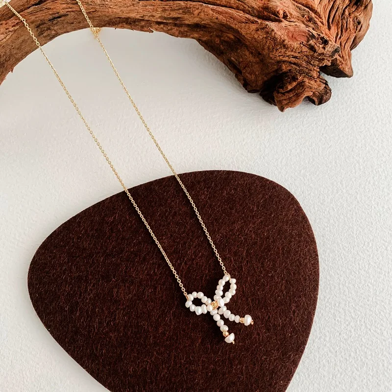 Orgin Summer Japanese Natural Freshwater Pearl Bowknot Pendant Necklace for Women Delicate Necklace Wedding Jewelry Hot Sale
Orgin Summer Japanese Natural Freshwater Pearl Bowknot Pendant Necklace for Women Delicate Necklace Wedding Jewelry Hot Sale
