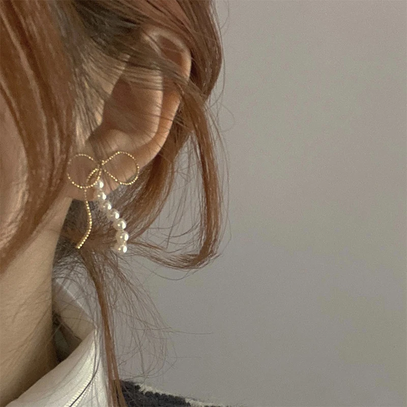 2021 New Arrival Pearl Metal Bowknot Dangle Earrings For Womens Girl Trendy Simple Hollow Line Aretes De Mujer Jewelry Gifts
2021 New Arrival Pearl Metal Bowknot Dangle Earrings For Womens Girl Trendy Simple Hollow Line Aretes De Mujer Jewelry Gifts