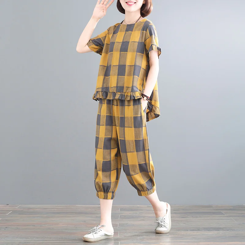 2020 new summer fashion lattice large size women's Lotus leaf short-sleeved shirt + wide leg pants cotton and linen two-piece
2020 new summer fashion lattice large size women's Lotus leaf short-sleeved shirt + wide leg pants cotton and linen two-piece