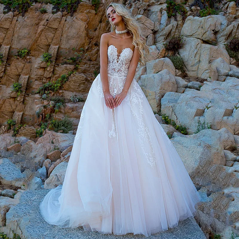Elegant Sleeveless Strapless Wedding Dress 2021 Chic Lace Appliques Tulle Backless A-line Bridal Gowns
Elegant Sleeveless Strapless Wedding Dress 2021 Chic Lace Appliques Tulle Backless A-line Bridal Gowns