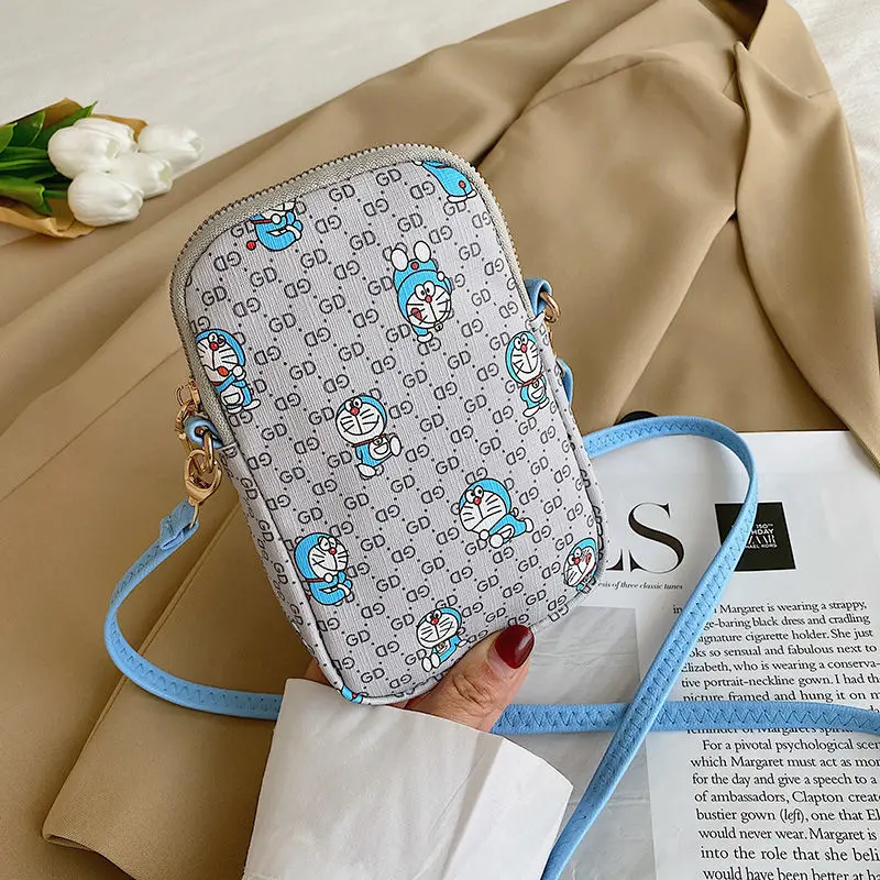 Doraemon 2021 New Small Satchel Cartoon Cute Doraemon Print Pattern One-shoulder Messenger Zipper Coin Purse
Doraemon 2021 New Small Satchel Cartoon Cute Doraemon Print Pattern One-shoulder Messenger Zipper Coin Purse