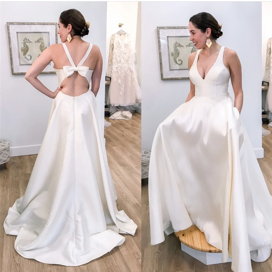 Simple Wedding Dress A-Line V-Neck Tank Bow Backless Satin Sleeveless Floor Length Sweep Train Bride Gown Tailor Made New
Simple Wedding Dress A-Line V-Neck Tank Bow Backless Satin Sleeveless Floor Length Sweep Train Bride Gown Tailor Made New