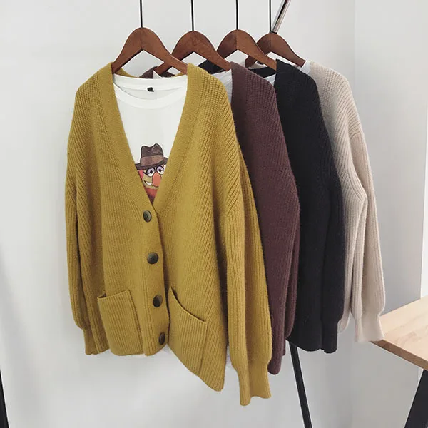 Solid Casual Sweater Cardigan Color v-neck Button Pocket Autumn And Winter Loose Thick long-sleeve Knit Sweaters
Solid Casual Sweater Cardigan Color v-neck Button Pocket Autumn And Winter Loose Thick long-sleeve Knit Sweaters