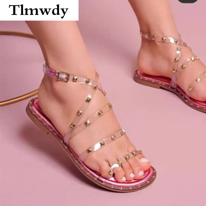 Сандалии женские с заклепками, удобные прозрачные босоножки на плоской подошве, повседневная обувь с открытым носком, лето 2021
Сандалии женские с заклепками, удобные прозрачные босоножки на плоской подошве, повседневная обувь с открытым носком, лето 2021