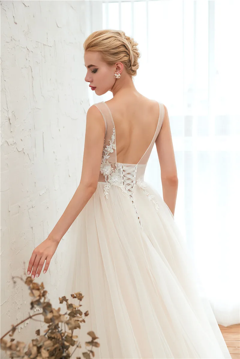 Simple Sexy Illusion Wedding Dress Deep V-neck Backless Lace-up Wedding Gowns With Pearls Vestido de Noiva
Simple Sexy Illusion Wedding Dress Deep V-neck Backless Lace-up Wedding Gowns With Pearls Vestido de Noiva