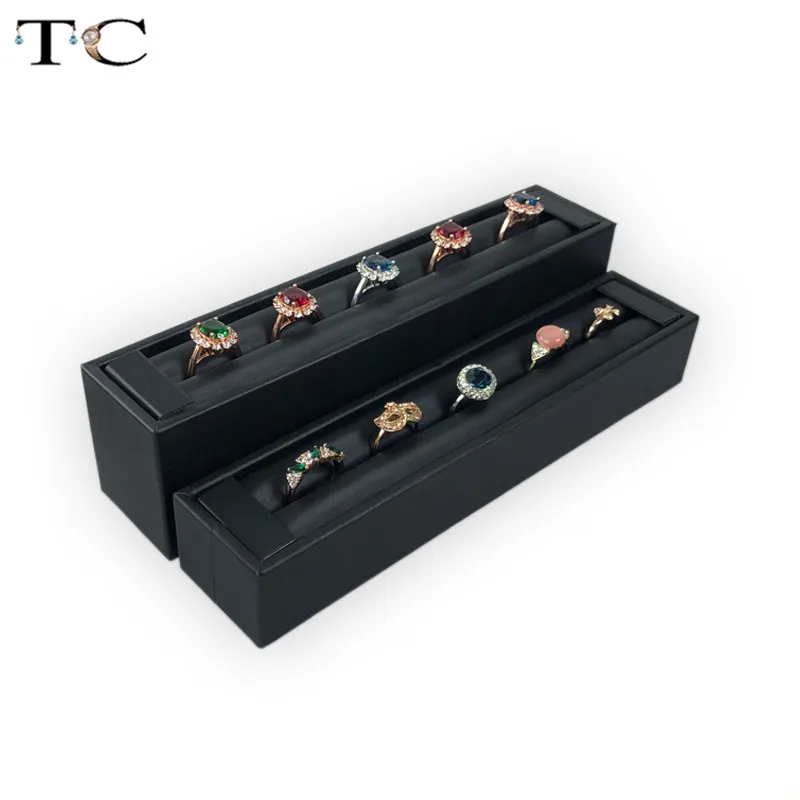 Soft Black PU Leather Ring Organizer Stand Display for Ring Ear Slots Stud Earring Storage Holder Rack Earring Display Case
Soft Black PU Leather Ring Organizer Stand Display for Ring Ear Slots Stud Earring Storage Holder Rack Earring Display Case
