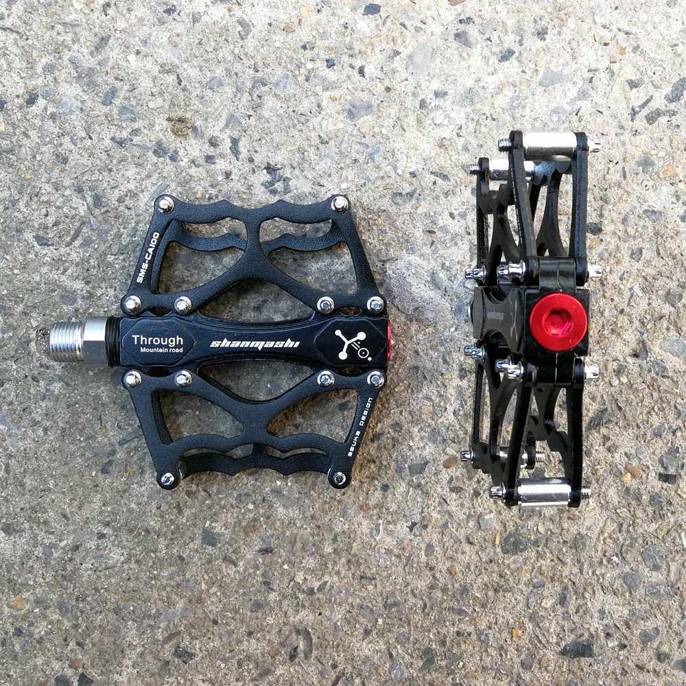 Shanmashi MTB Road Bike Pedals Aluminum Alloy Anti-slip Bicycle Pedals CNC Peilin Hollow-carved Design Pedals Bicycle Accessorie
Shanmashi MTB Road Bike Pedals Aluminum Alloy Anti-slip Bicycle Pedals CNC Peilin Hollow-carved Design Pedals Bicycle Accessorie