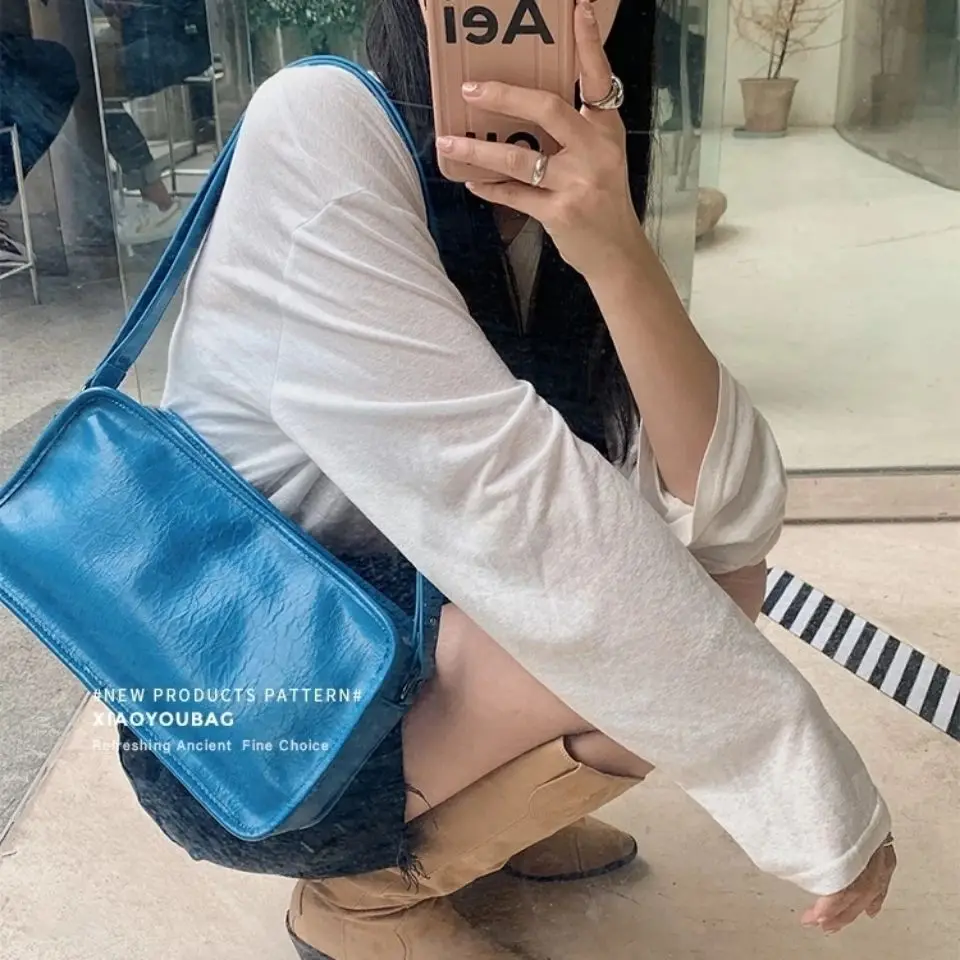 2021 Новая роскошная брендовая модная сумочка из искусственной кожи нишевой дизайн INS простая сумка-мессенджер через плечо ретро квадратная ...
2021 Новая роскошная брендовая модная сумочка из искусственной кожи нишевой дизайн INS простая сумка-мессенджер через плечо ретро квадратная ...