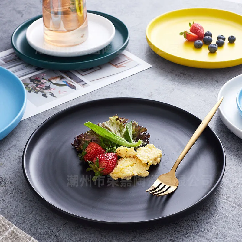 Solid color round baking plate Household dishes glazed ceramic tableware Western food steak plate snack plate
Solid color round baking plate Household dishes glazed ceramic tableware Western food steak plate snack plate