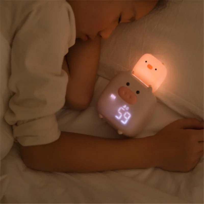 Creative pig Tai Lang smart alarm clock USB charging silicone night light LED digital wake up Bedside Alarm Clock A029
Creative pig Tai Lang smart alarm clock USB charging silicone night light LED digital wake up Bedside Alarm Clock A029