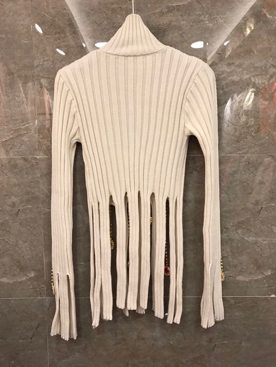2020 Autumn and Winter new women's high collar colored diamond striped woven decorative long sleeve tassel sweater 916
2020 Autumn and Winter new women's high collar colored diamond striped woven decorative long sleeve tassel sweater 916