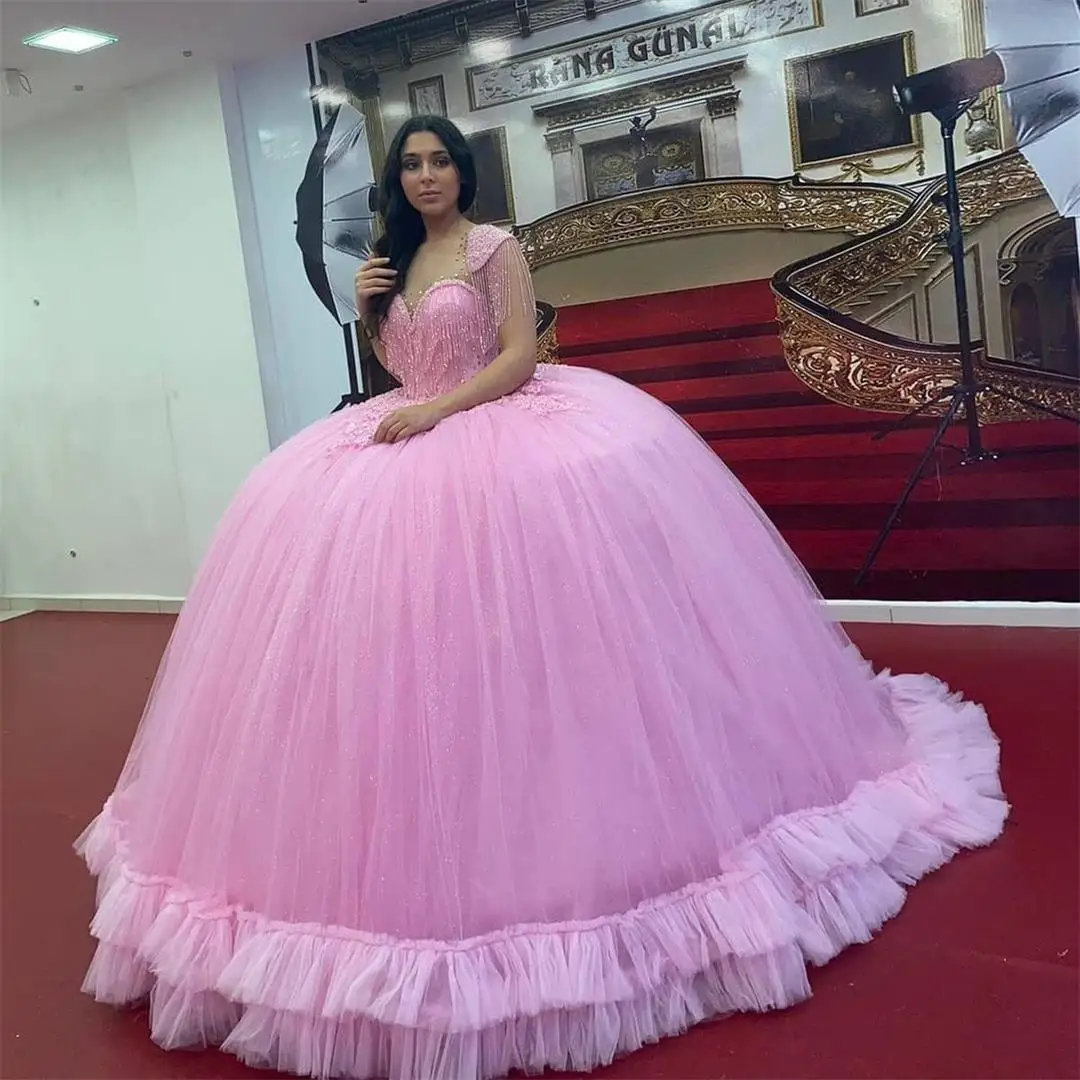 Puffy Pink Ball Gown Quinceanera Dresses 2022 Cap Sleeve Tassels Lace Crystal Prom Gowns Lace-up Corset Sweet 15 Party Dress
Puffy Pink Ball Gown Quinceanera Dresses 2022 Cap Sleeve Tassels Lace Crystal Prom Gowns Lace-up Corset Sweet 15 Party Dress
