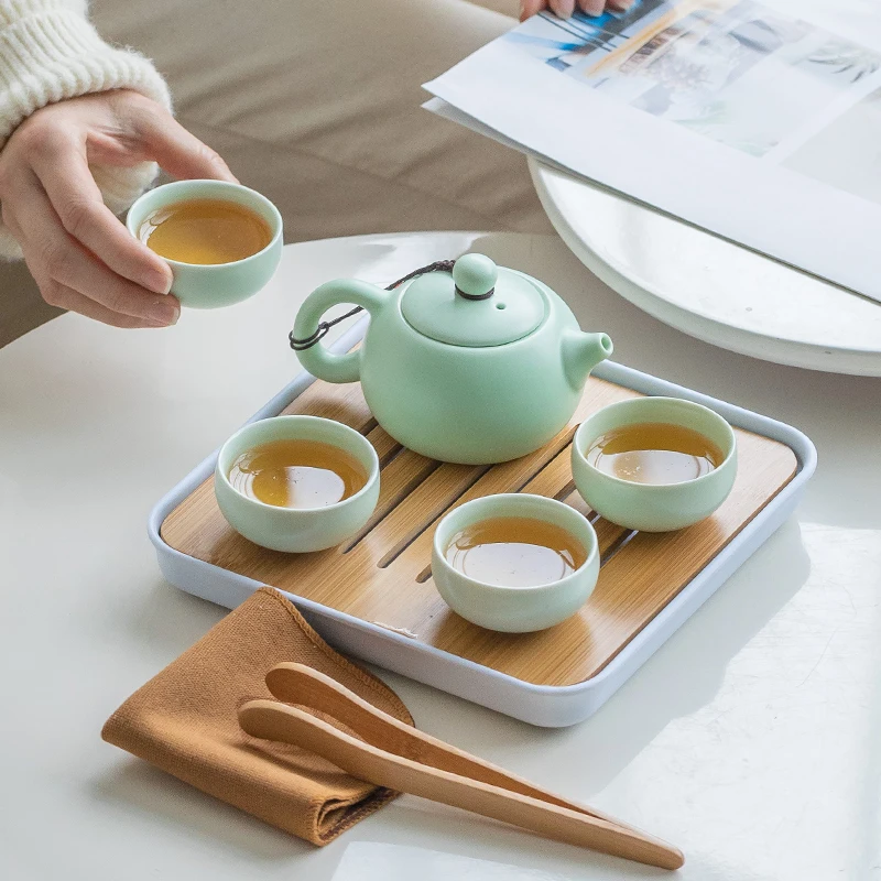 Portable Teaware Home Office Chinese Ceramic Teapot Set Travel Tea set Porcelain Teacups Teaware with Serving Tray Tea Infuser
Portable Teaware Home Office Chinese Ceramic Teapot Set Travel Tea set Porcelain Teacups Teaware with Serving Tray Tea Infuser
