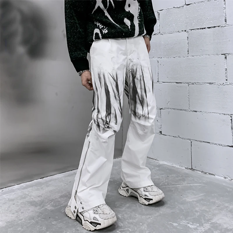 Hand painted graffiti tactical pants side zipper baggy pants men high street korean streetwear punk pants 21027 
Hand painted graffiti tactical pants side zipper baggy pants men high street korean streetwear punk pants 21027