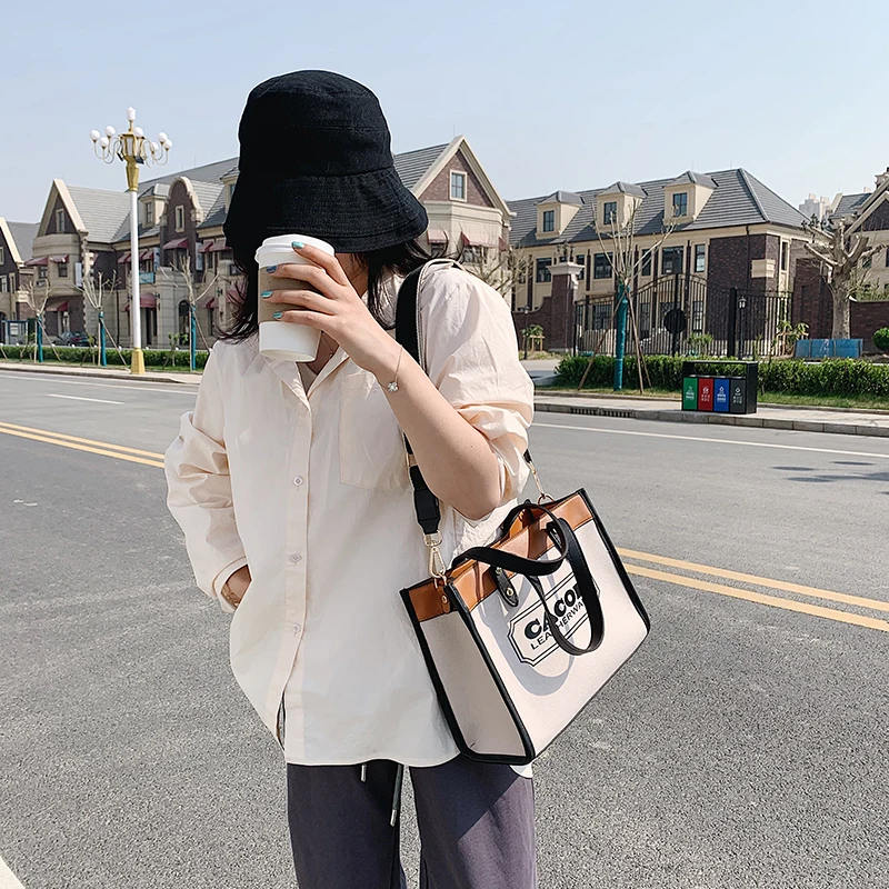 2021 New Woman Tote Bag Fashion Letter Big Capality Canvas Bag Casual Shoulder Messenger Bags Unisex Patchwork Shopping Bag
2021 New Woman Tote Bag Fashion Letter Big Capality Canvas Bag Casual Shoulder Messenger Bags Unisex Patchwork Shopping Bag